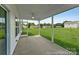 Covered patio offering a view of the expansive backyard, perfect for outdoor relaxation at 510 Black Bear St # 145P, China Grove, NC 28023