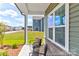Inviting porch with seating area and view of the backyard at 510 Black Bear St # 145P, China Grove, NC 28023