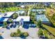 Aerial view of the community clubhouse, parking, and well-manicured landscaping at 5103 Looking Glass Trl, Denver, NC 28037