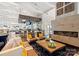Stylish clubhouse interior with a cozy fireplace, bar area, and comfortable lounge seating at 5103 Looking Glass Trl, Denver, NC 28037