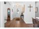 Elegant entryway with hardwood floors, decorative lighting, and stylish furnishings at 5103 Looking Glass Trl, Denver, NC 28037