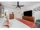 Large bedroom featuring a fan, a television and hardwood floors at 5218 Addison Dr, Charlotte, NC 28211