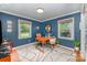 Bright office features natural light, wood desk, stylish decor, and modern chair at 5218 Addison Dr, Charlotte, NC 28211