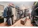 Spacious walk-in closet with storage for clothes, shoes and other items at 5218 Addison Dr, Charlotte, NC 28211