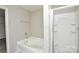 Bathroom with soaking tub, separate shower, and linen closet at 5219 Biederbeck Dr, Charlotte, NC 28212