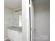 Bright bathroom featuring a double sink vanity and a large mirror at 5219 Biederbeck Dr, Charlotte, NC 28212