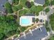 Overhead view of a community pool with manicured landscaping and seating areas at 650 Raphael Pl, Charlotte, NC 28205