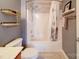 Cozy bathroom features a shower with grey tiling and neutral decor at 650 Raphael Pl, Charlotte, NC 28205