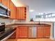 Bright kitchen with stainless steel appliances and granite countertops at 650 Raphael Pl, Charlotte, NC 28205