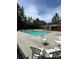 Inviting community pool area with lounge chairs for relaxing and enjoying the sun at 650 Raphael Pl, Charlotte, NC 28205