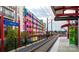 View of a modern 36th Street train station with colorful buildings nearby at 650 Raphael Pl, Charlotte, NC 28205