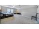 Bright, spacious bedroom featuring neutral walls, carpet, and a comfortable bed, creating a relaxing retreat at 7123 Meyer Rd, Fort Mill, SC 29715