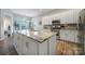 Kitchen with a large center island, stainless steel appliances, and plenty of natural light at 7123 Meyer Rd, Fort Mill, SC 29715