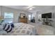 Comfortable main bedroom with large dresser and natural light at 7123 Meyer Rd, Fort Mill, SC 29715