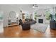 Spacious living room with hardwood floors, fireplace, and ample natural light at 7417 Chidley Dr, Charlotte, NC 28269