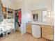 Spacious walk-in closet with custom shelving, vanity, and ample storage space at 7679 Rabbit Cir, Denver, NC 28037