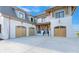 Magnificent home with white brick, copper gutters, wooden accents, and spacious three-car garage at 7679 Rabbit Cir, Denver, NC 28037