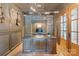 Stylish home office with custom built-ins, hardwood floors, and ample natural light at 7679 Rabbit Cir, Denver, NC 28037