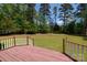 The expansive backyard includes a custom wood deck and retaining wall at 777 Sanside Dr, York, SC 29745