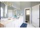Spacious bathroom with double sinks, a large mirror, and a separate toilet room offers a functional and bright space at 777 Sanside Dr, York, SC 29745