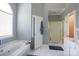Bright bathroom with a garden tub and a shower, offering a relaxing and functional space at 777 Sanside Dr, York, SC 29745