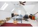Large bonus room with skylights, ceiling fan, table tennis and carpeted area is perfect for entertaining at 777 Sanside Dr, York, SC 29745