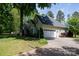 Exterior view of the home shows a lush lawn and attached two car garage at 777 Sanside Dr, York, SC 29745