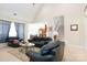 Open-concept living room with view into dining area and staircase at 777 Sanside Dr, York, SC 29745