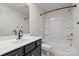 Sleek bathroom features a modern vanity, a framed mirror, and a tub with a shower at 8000 Millbridge Pkwy, Waxhaw, NC 28173
