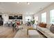 Spacious open-concept layout seamlessly connects the kitchen, dining, and living areas for a modern living experience at 8000 Millbridge Pkwy, Waxhaw, NC 28173