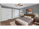 Virtually Staged bedroom featuring hardwood floors and neutral tones at 8214 Coristar Pl, Huntersville, NC 28078