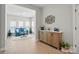 Cozy living area with a blue couch, large windows, and stylish decor at 8726 Castle Cliff Dr, Matthews, NC 28105