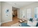 Inviting living area with an open floor plan, bright lighting, and comfortable seating at 8726 Castle Cliff Dr, Matthews, NC 28105