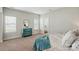 Bright main bedroom with plenty of natural light and access to an ensuite bathroom at 8726 Castle Cliff Dr, Matthews, NC 28105