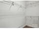 Empty walk-in closet with wire shelving, ready for customization and organization at 8726 Castle Cliff Dr, Matthews, NC 28105