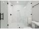 Modern bathroom with a glass enclosed shower, rainfall showerhead, and marble-look tiling at 925 Twin Lakes Rd, Rock Hill, SC 29732