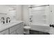 Modern bathroom featuring a white vanity, dark tile floors, and a shower-tub combo at 925 Twin Lakes Rd, Rock Hill, SC 29732