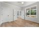 Bright bedroom with ample natural light, ceiling fan, and doors to the balcony at 925 Twin Lakes Rd, Rock Hill, SC 29732