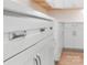 Close up of a white kitchen cabinet with sleek hardware and a modern design at 925 Twin Lakes Rd, Rock Hill, SC 29732