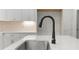 Kitchen island sink with stainless steel appliances, light countertops and modern hardware at 925 Twin Lakes Rd, Rock Hill, SC 29732