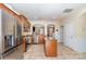 Open kitchen with stainless steel appliances, granite countertops, and a center island at 9527 Turning Wheel Dr, Charlotte, NC 28214