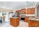 Bright kitchen with stainless steel appliances, granite countertops and a breakfast nook at 9527 Turning Wheel Dr, Charlotte, NC 28214