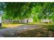Large yard featuring a shed and driveway at 105 Hopper St, Clover, SC 29710