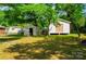 View of backyard featuring two sheds and grassy area at 105 Hopper St, Clover, SC 29710