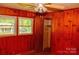 Wood paneled bedroom featuring natural light and closet at 105 Hopper St, Clover, SC 29710