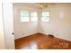 Sunlit bedroom with hardwood floors, neutral walls, and ample space at 105 Hopper St, Clover, SC 29710