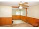 Charming dining space featuring wallpaper, light fixture, and wood trim at 105 Hopper St, Clover, SC 29710