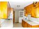 Functional kitchen with laminate counters, wood cabinetry, and space for customization at 105 Hopper St, Clover, SC 29710