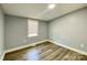 Bedroom with a window and laminate floors at 109 Bee Tree Ln, Salisbury, NC 28144
