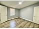 Bedroom featuring laminate floors and window at 109 Bee Tree Ln, Salisbury, NC 28144